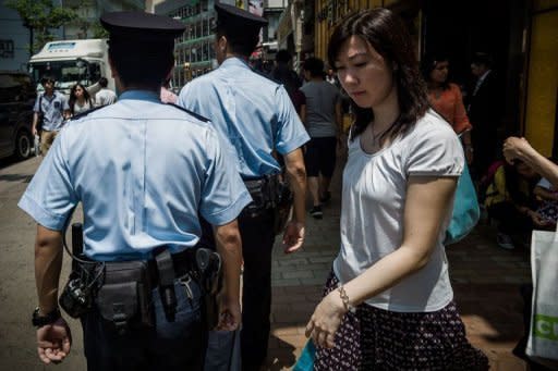 In a first for Asia, Hong Kong police said Thursday they will trial the use of video cameras attached to their uniforms to film exchanges with the public, despite concerns from human rights groups