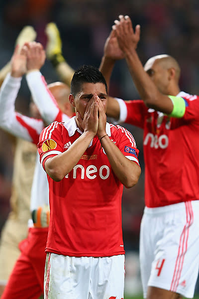 <p>A dejected Enzo Perez of Benfica shows his emotions after defeat.</p>