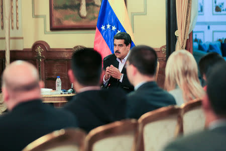 Venezuela's President Nicolas Maduro attends a meeting with members of the Venezuelan diplomatic corp after their arrival from the United States, at the Miraflores Palace in Caracas, Venezuela January 28, 2019. Miraflores Palace/Handout via REUTERS