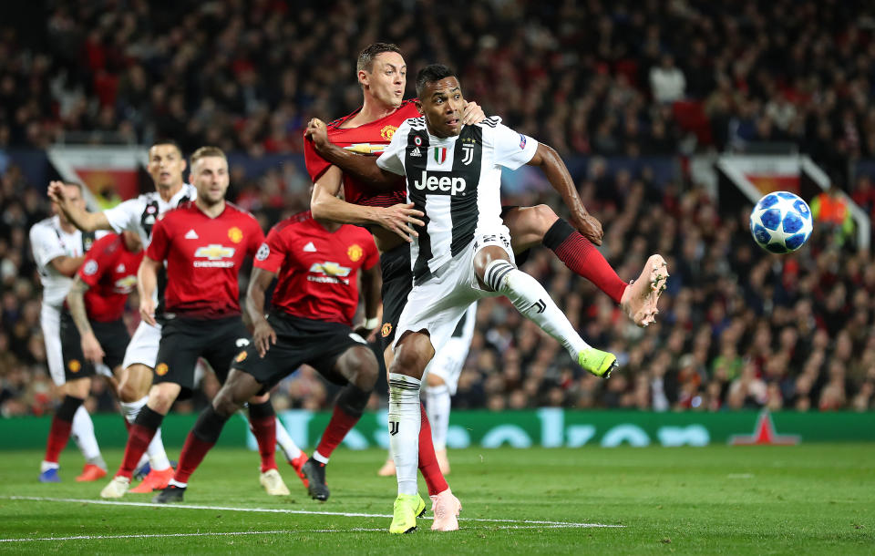 Manchester United’s Nemanja Matic (left) and Juventus’ Alex Sandro get in a tangle