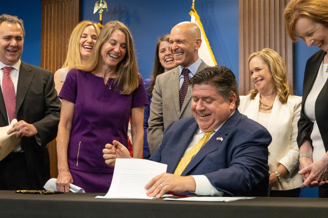 "Oh, I’m signed!” exclaims Sen. Laura Fine, D-Glenview, as she realizes that her bill giving the Department of Insurance new oversight authority had been approved by Gov. JB Pritzker.