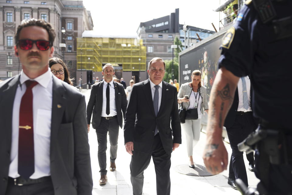 Sweden's Prime Minister Stefan Lofven, front centre, leaves parliament after he lost a confidence vote in the Swedish Parliament in Stockholm, Monday June 21, 2021. Stefan Lofven, Sweden’s Social Democratic prime minister since 2014, lost a confidence vote in parliament on Monday. (Nils Petter Nilsson / TT via AP)