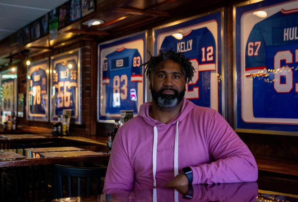 Christian Gaddis, former center for the Buffalo Bills, hangs out at the Big Tree Inn in Buffalo, N.Y.  on Jan. 30, 2022, during the AFC Championship game between the Kansas City Chiefs and the 
Cincinnati Bengals. “That loss isn’t going to defines us because we’re ready to bounce back,” said Gaddis when talking about the last 13 seconds of the divisional game that saw the Bills season end in overtime.