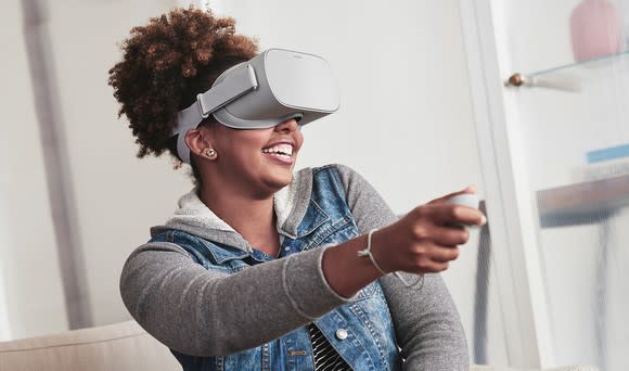 Woman using Oculus Go.