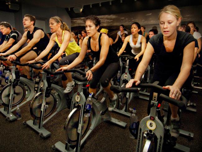 SoulCycle riders cycling