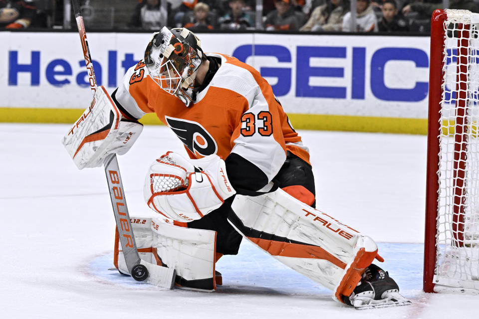 Philadelphia Flyers goaltender Samuel Ersson blocks a shot by the Anaheim Ducks during the second period of an NHL hockey game in Anaheim, Calif., Monday, Jan. 2, 2023. (AP Photo/Alex Gallardo)