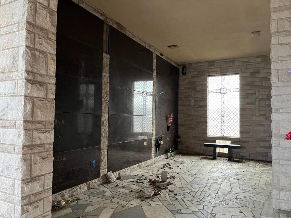 The vestibule floor of a mausoleum at Lake View Memorial Gardens in Fairview Heights is littered with trash, debris and square stones that have fallen off the facade around crypts.