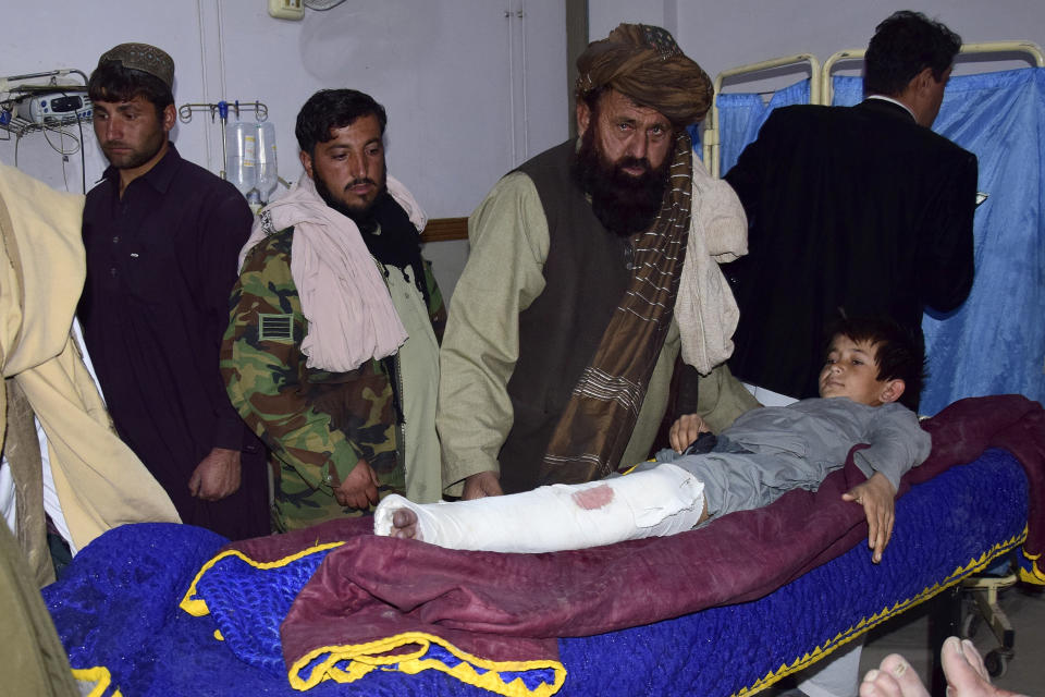 A boy, who was injured in the Afghan forces shelling, is treated in a hospital, in Quetta, Pakistan, Sunday, Dec. 11, 2022. Pakistan's army says deadly shelling from Afghan forces has killed some people in a border town. The violence hitting southwestern Pakistan's town of Chaman was the latest in a series of deadly incidents and attacks that have skyrocketed tensions with Afghanistan's Taliban rulers. (AP Photo/Arshad Butt)