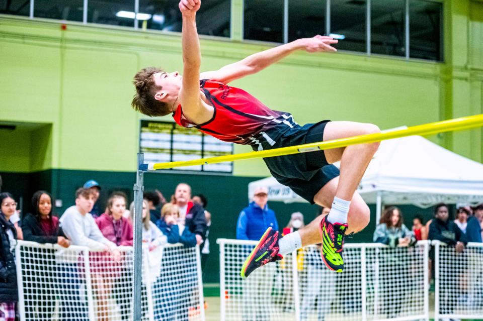 Old Rochester's Sam Balsis competes in the high jump at the SCC Championship at GNB Voc-Tech.