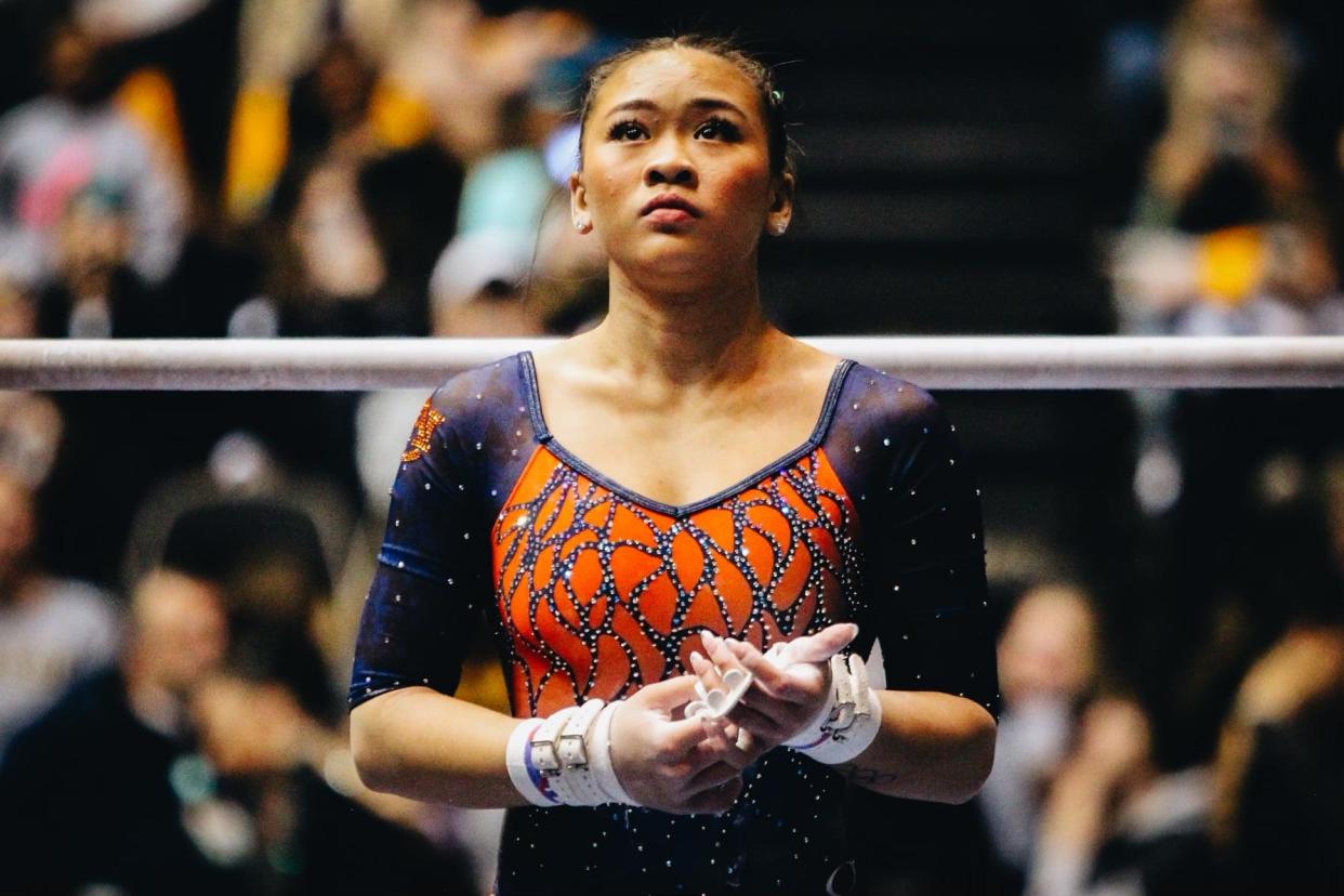 Auburn sophomore Sunisa Lee prepares for her uneven bar routine during a meet against Missouri on Feb. 19, 2023, at the Hearnes Center in Columbia, Mo.