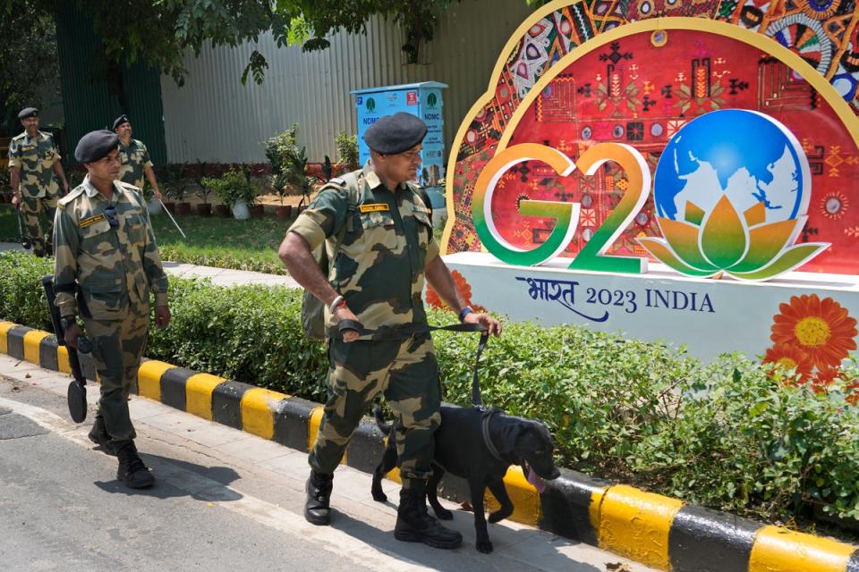 Soldiers patrol the grounds of the Group of 20 summit, taking place this weekend in New Delhi, India (AP)