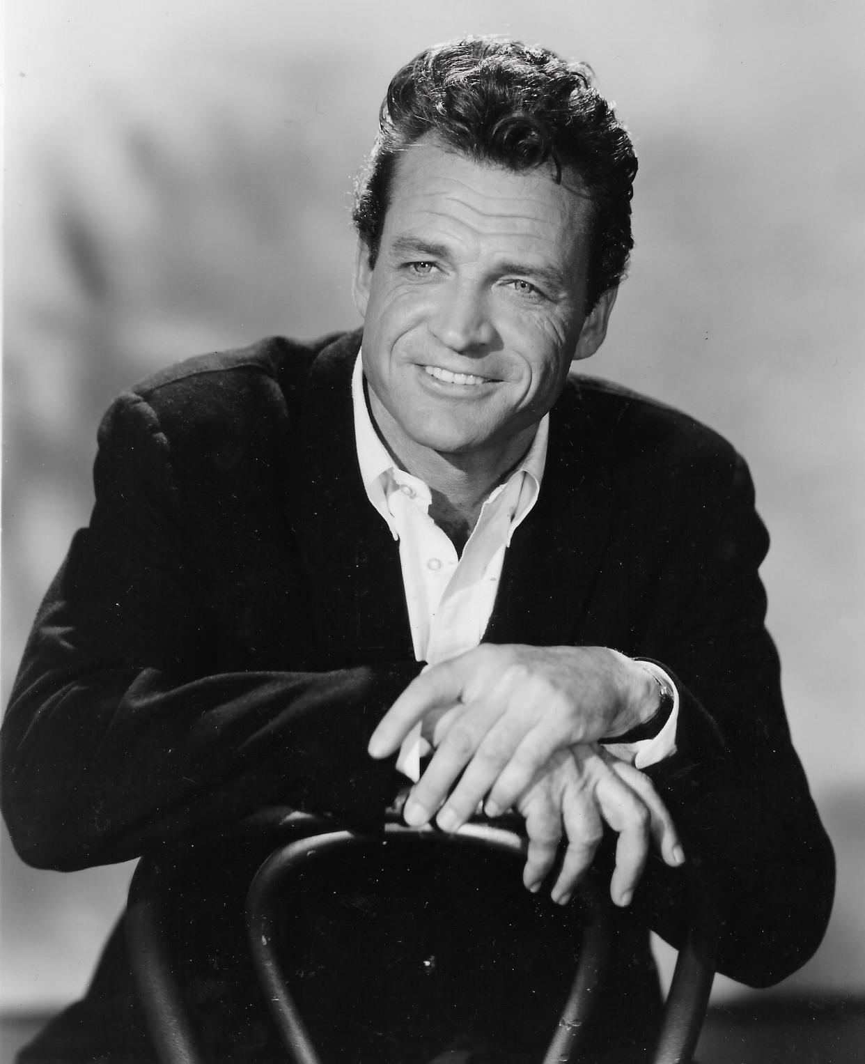 Hollywood actor David McLean, an Akron native whose real name was Gene Huth, sits for a studio portrait during the 1962 filming of an episode of the NBC Western series “Laramie.”