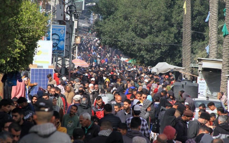 Displaced Palestinians at Balah central market district in Deir al-Balah, Gaza.