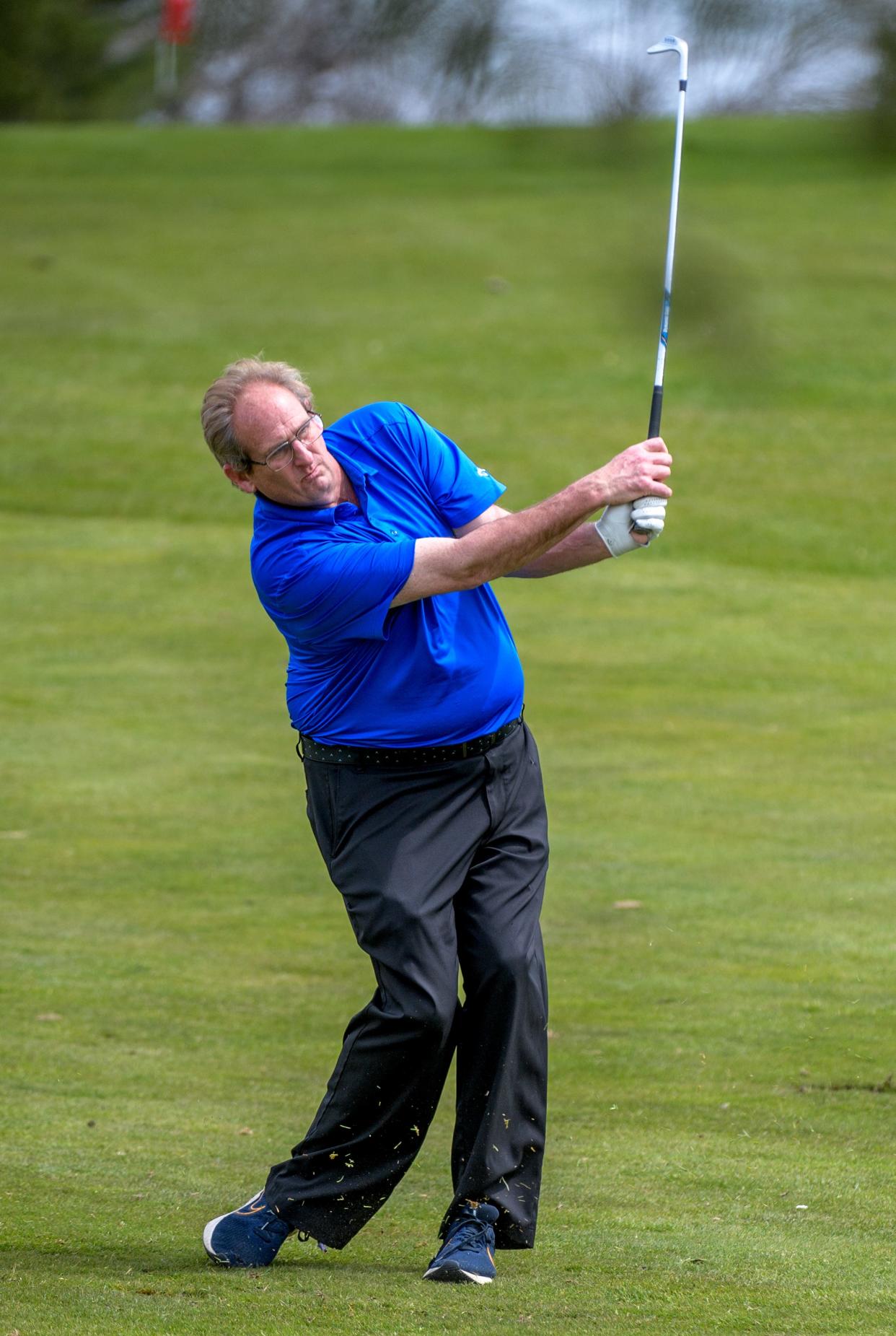 Peoria Park District golf superintendent Greg Walker watches his drive from the fairway on No. 9 during the Spring Swing event Wednesday, April 10, 2024 at Kellogg Golf Course in Peoria.