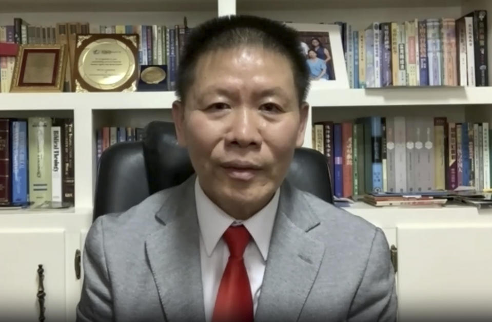 In this image taken from video, Chinese-American Christian pastor Bob Fu speaks during an interview on April 5, 2024. American officials say foreign countries like Iran and China intimidate, harass and sometimes plot violence against political opponents and activists in the U.S. Fu, whose organization, ChinaAid, advocates for religious freedom in China, said he has endured far-ranging harassment campaigns for years. Large crowds of demonstrators have amassed for days at a time outside his West Texas home, arriving by bus in well-coordinated actions he believes can be linked to the Chinese government. (AP Photo)