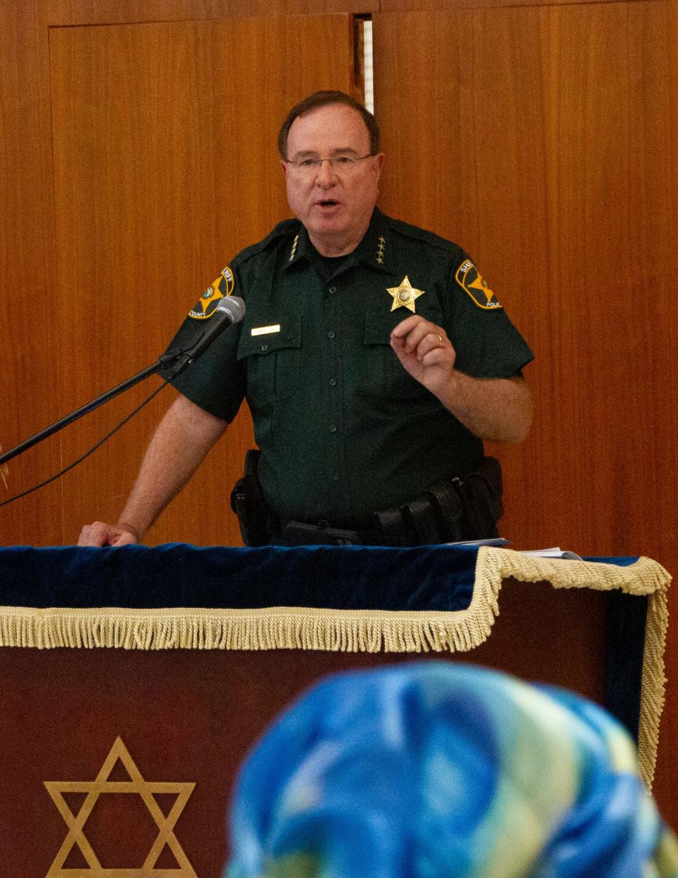 Polk County Sheriff Grady Judd expresses support for Israel during a rally Wednesday night at Temple Emanuel in Lakeland. Judd said his agency has increased security for local Jewish groups.