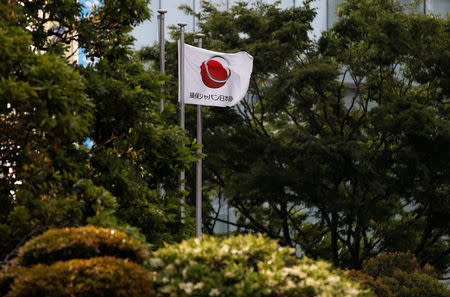 A flag of Sompo Japan Nipponkoa Insurance Inc is seen at the company's headquarters in Tokyo, Japan, May 19, 2016. REUTERS/Toru Hanai