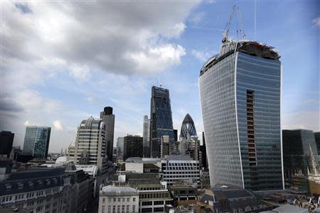 The Walkie Talkie tower (R) is seen in central London September 3, 2013. REUTERS/Stefan Wermuth