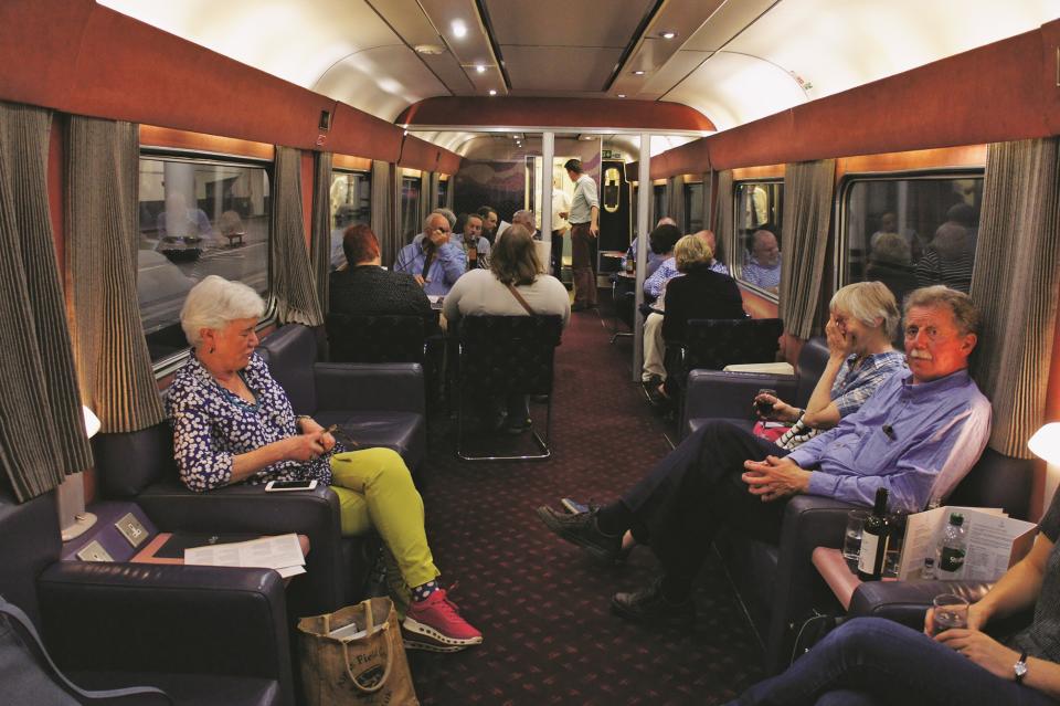 The lounge car quickly fills up as the train prepares to depart from Euston station