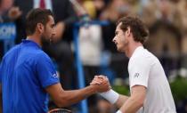 Britain Tennis - Aegon Championships - Queens Club, London - 18/6/16 Great Britain's Andy Murray shakes the hand of Croatia's Marin Cilic after winning his semi final match Action Images via Reuters / Tony O'Brien