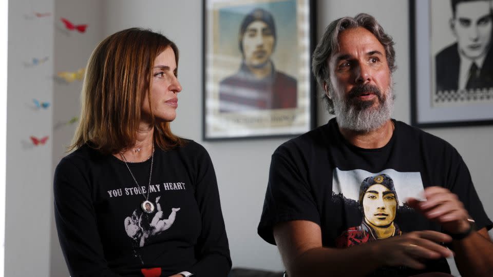 Manuel and Patricia Oliver lost their son, Joaquin, 17, in the 2018 mass shooting at Marjory Stoneman Douglas High in Parkland, Florida. Their organization, Change the Ref, helped launch the new voice message campaign. - Cody Jackson/AP