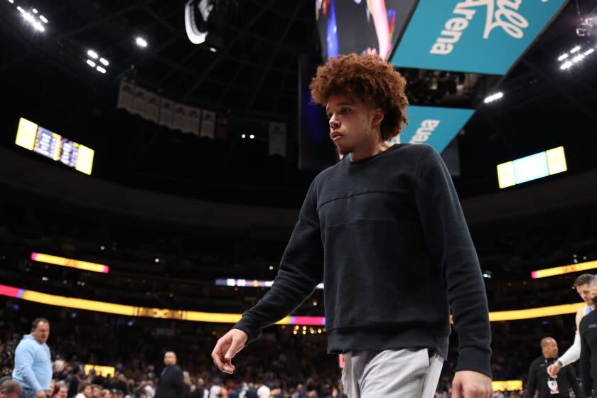 DENVER, CO - MARCH 22: Jason Preston #17 of the LA Clippers walks off the court.