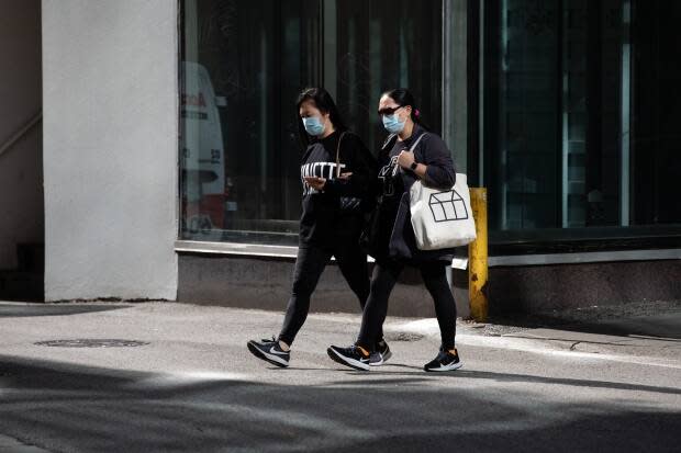 Pedestrians on Robson Street in downtown Vancouver on Sept. 15. (Maggie MacPherson/CBC - image credit)