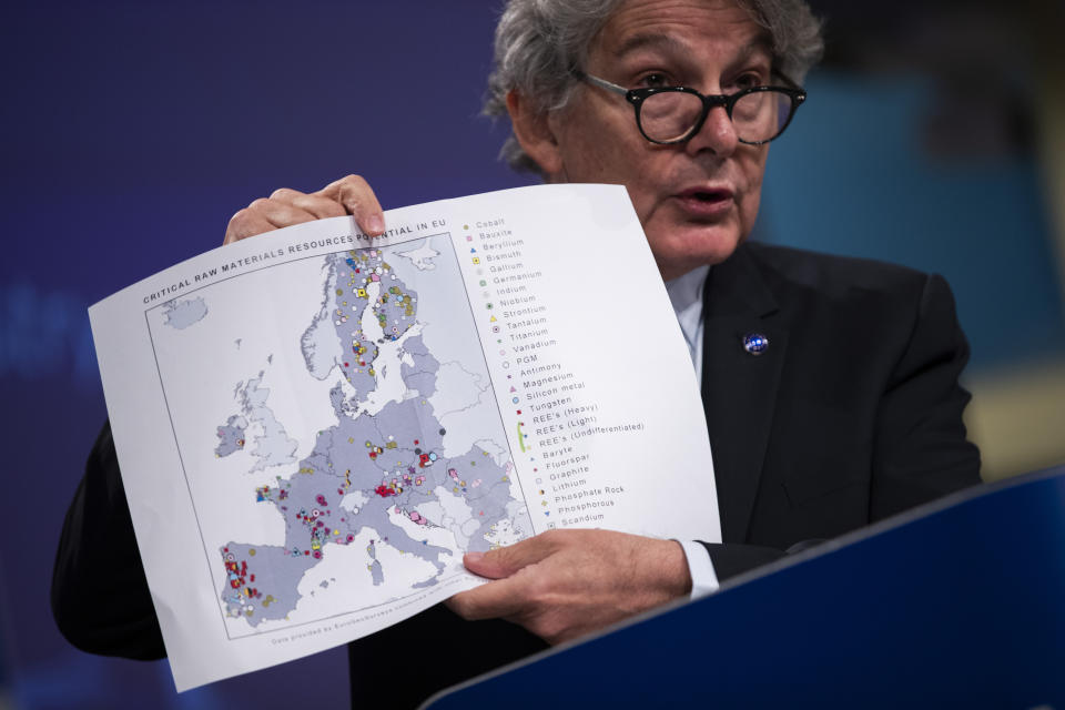 European Commissioner for Internal Market Thierry Breton shows a map of Europe as he talks to journalists during an online news conference at the EU headquarters in Brussels, Thursday, Sept. 3, 2020. Worried by an increasing dependency on the raw materials used to make smart phones, televisions and energy-saving lights, the European Union on Thursday launched a new strategy to secure access to rare earth minerals and reduce reliance on suppliers like Chile, China and South Africa. (AP Photo/Francisco Seco, Pool)