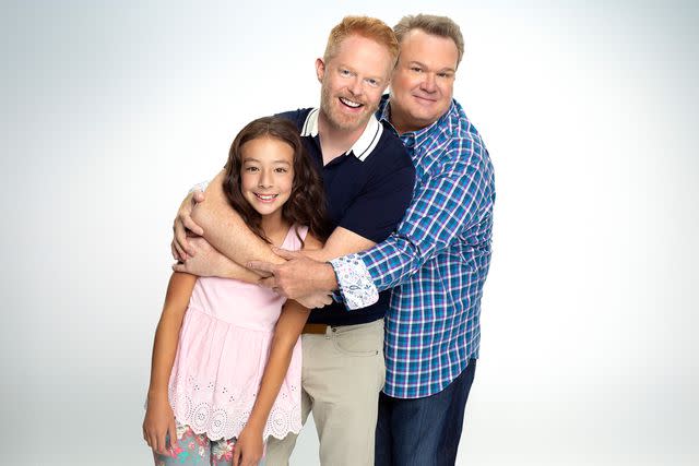 <p>Robert Ashcroft via Getty</p> Aubrey Anderson-Emmons as Lily Tucker-Pritchett, Jesse Tyler Ferguson as Mitchell Pritchett, and Eric Stonestreet as Cameron Tucker on 'Modern Family'