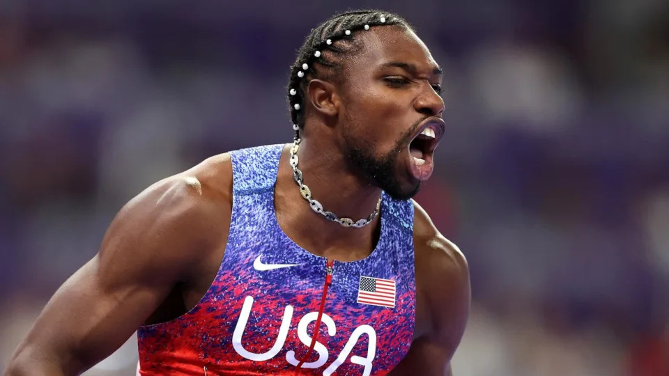 PHOTO: Noah Lyles of the U.S celebrates winning the gold medal in the men's 100m final at the 2024 Paris Olympic Games, Aug. 4, 2024. (Julian Finney/Getty Images)