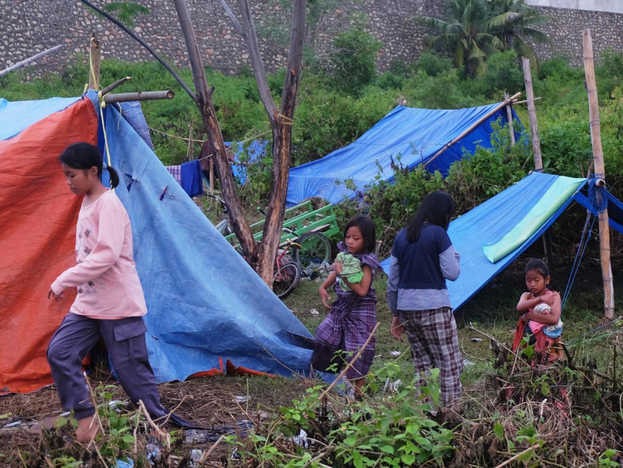 Evacuees are living in refugee camps after the earthquake that struck Majene, West Sulawesi several days ago (Anadolu Agency via Getty Images)