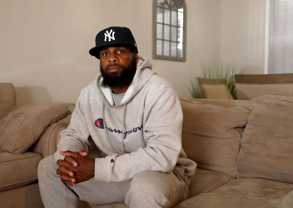 Jerell Jones, pictured at his home in Yonkers June 22, 2022, was Nyack HS football coach since 2017 before resigning in March without explanation. He also resigned as a physical education teacher, effective this month. He now says he left because he was incorrectly accused by the Nyack HS principal and Nyack athletic director of using profanity, including the N word, at his players following a game in October.