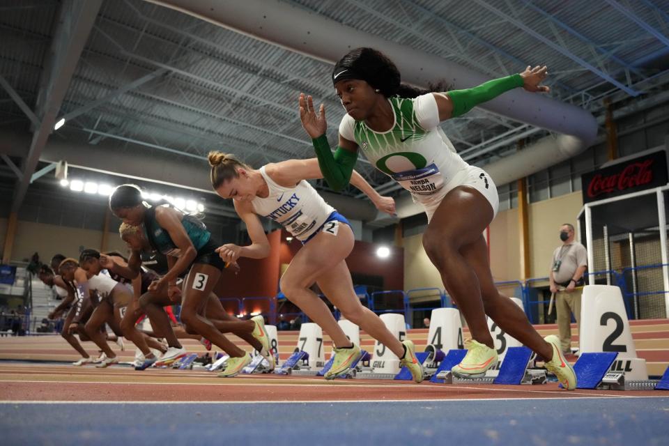 Mar 11, 2022; Birmingham, AL, USA; Kemba Nelson of Oregon and Abby Steiner of Kentucky in the starting blocks of a wonen's 60m heat during the NCAA Indoor Track and Field Championships at Crossplex. Mandatory Credit: Kirby Lee-USA TODAY Sports