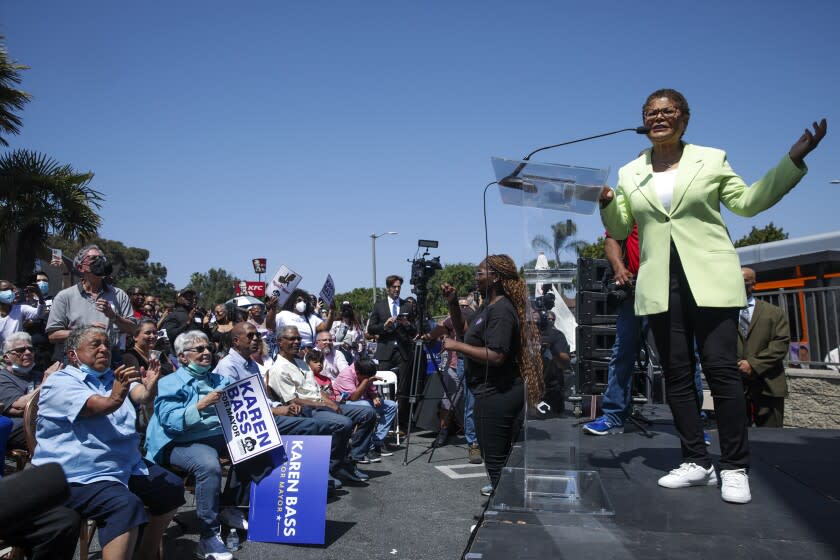 Los Angeles, CA - April 30: Congresswoman Karen Bass, who is running for LA Mayor, right, addresses her supporters and volunteers at the opening of her campaign headquarters on 3601 La Brea Avenue on Saturday, April 30, 2022 in Los Angeles, CA. (Irfan Khan / Los Angeles Times)