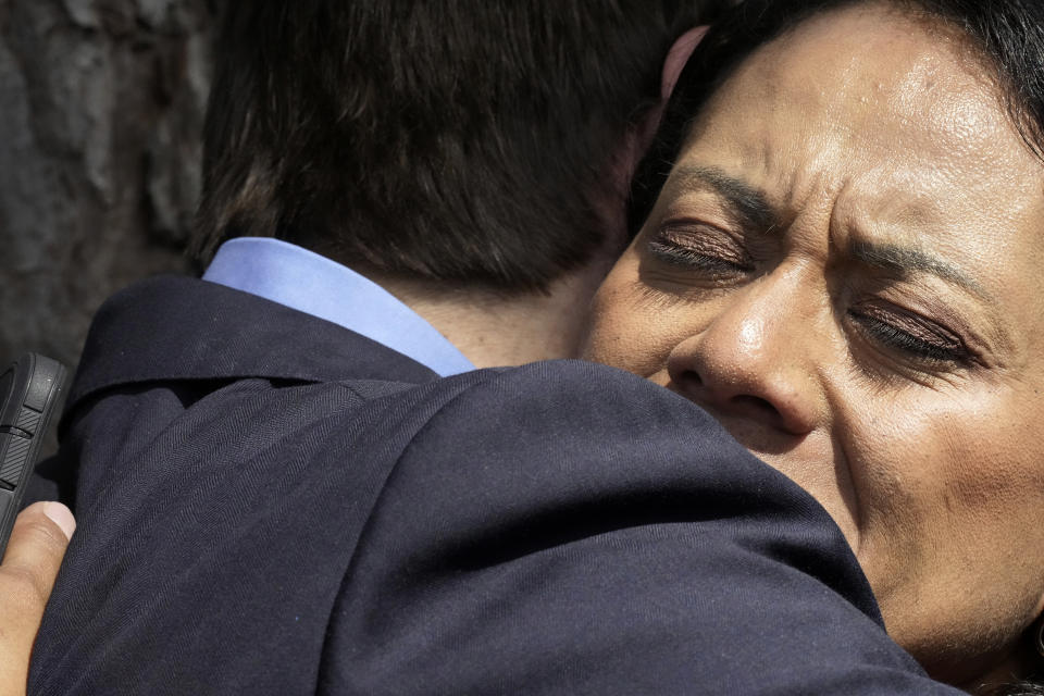 Florida Gov. Ron DeSantis hugs supporter Lupi Tupou after a campaign event in Bluffton, S.C., on Friday, June 2, 2023. On the heels of his official campaign launch, DeSantis has been visiting the early voting states of Iowa, New Hampshire and South Carolina this week. (AP Photo/Meg Kinnard)