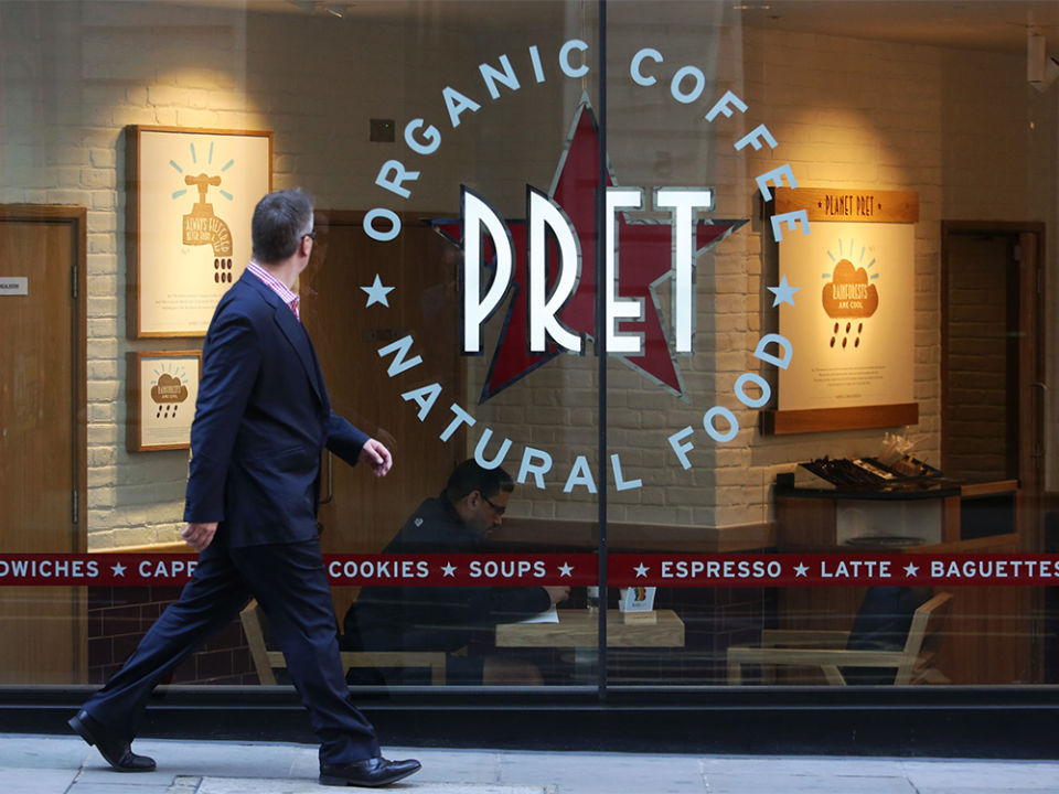  A pedestrian passes a Pret A Manger sandwich store in London. The U.K. chain is opening its first standalone restaurant in Canada, in Toronto’s financial district.