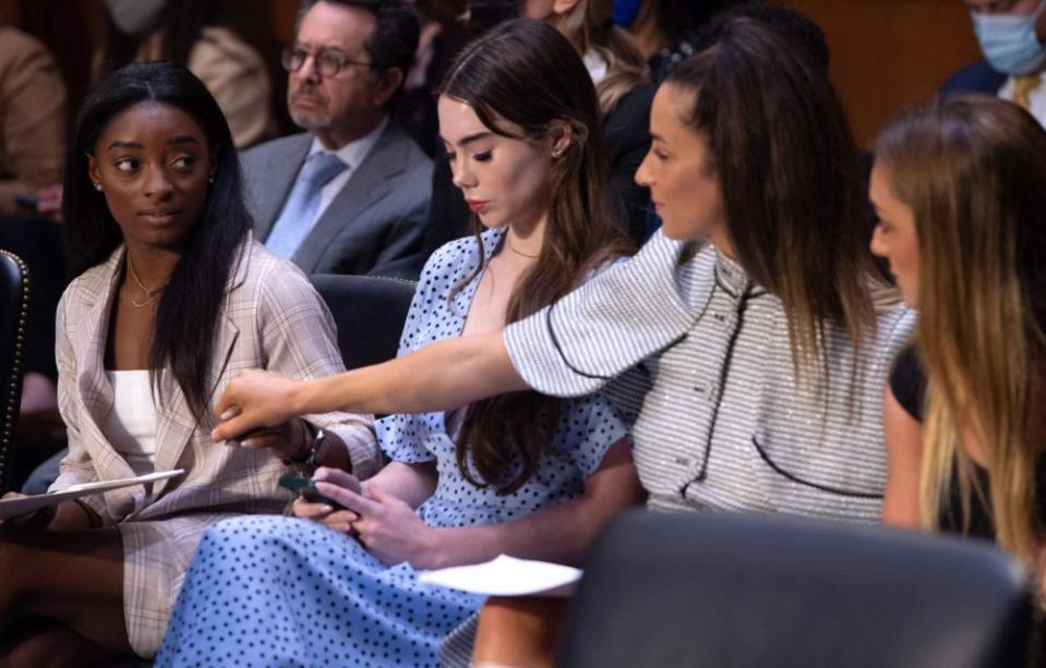 From left, US Olympic gymnasts Simone Biles, McKayla Maroney, Aly Raisman and Maggie Nichols, arrive to testify during a Senate judiciary hearing.