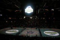 Apr 7, 2018; Toronto, Ontario, CAN; The logo of the Humboldt Broncos is displayed on the ice and scoreboard during a moments silence in tribute to the team before a game between the Montreal Canadiens and Toronto Maple Leafs at the Air Canada Centre. Mandatory Credit: John E. Sokolowski-USA TODAY Sports