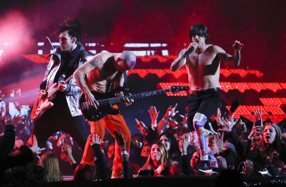 The Red Hot Chili Peppers perform during the halftime show of the NFL Super Bowl XLVIII football game between the Seattle Seahawks and the Denver Broncos Sunday, Feb. 2, 2014, in East Rutherford, N.J. (AP Photo/Matt York)