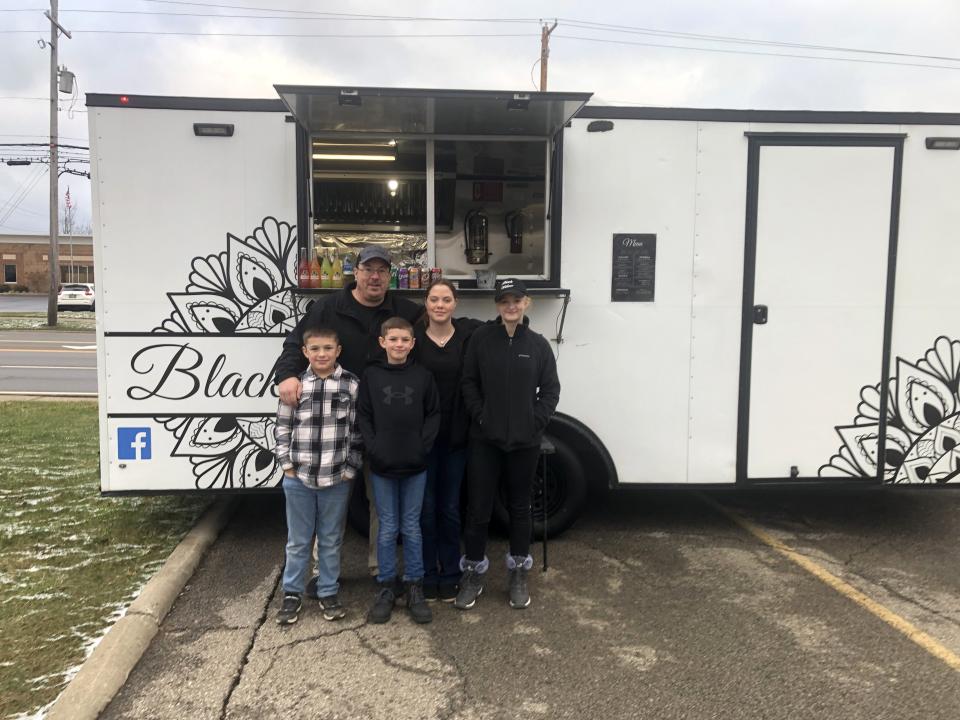 The Black Willow Food Truck in Mansfield is truly a family affair. Bryan and Jessica Beller's 11 children often help with its operation.