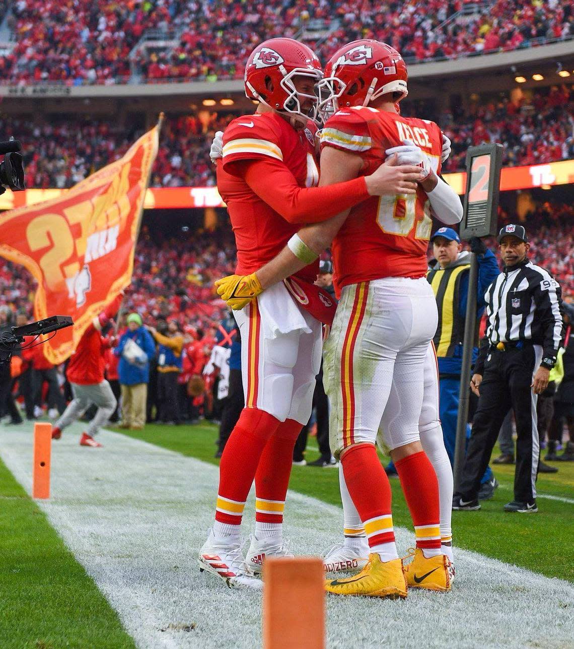 Kansas City Chiefs quarterback Chad Henne, left, celebrates with tight end Travis Kelce after Kelce scored with a pass reception in the second quarter against the Jacksonville Jaguars during the Divisional Round game Saturday, Jan. 21, 2023 at GEHA Field at Arrowhead Stadium.