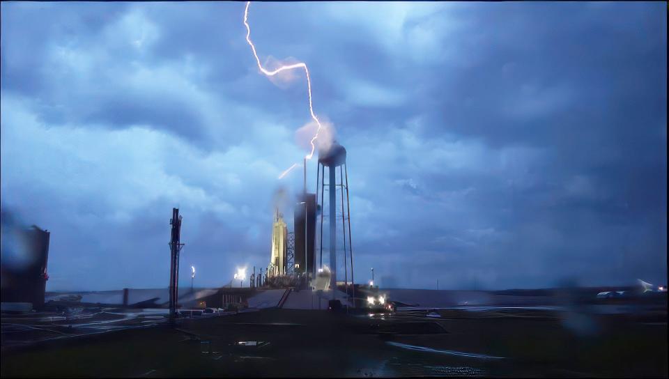 This image provided by SpaceX shows a direct lightning strike to the lightning protection system at Kennedy Space Center's Launch Complex 39-A, where a SpaceX triple-core Falcon Heavy awaited launch on Thursday, April 27, which was eventually scrubbed due to poor weather.