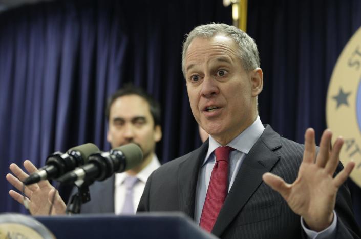 FILE - In this March 21, 2016, file photo, New York Attorney General Eric Schneiderman speaks during a news conference in New York. Schneiderman says his colleagues and other lawyers are being moved to action because they believe Trump "does not have respect for the rule of law." (AP Photo/Seth Wenig, File)