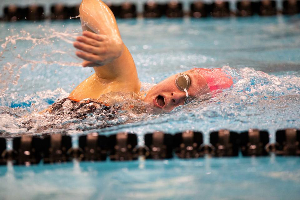 Hope's Paige Kunn competes in the 1000 yard freestyle against Calvin Friday, Jan. 27, 2023, at the Venema Aquatic Center at Calvin University. 