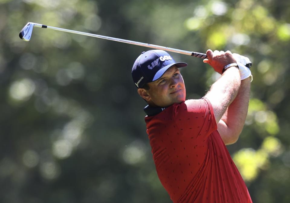 FILE - Patrick Reed watches his tee shot on the fourth hole during the first round of the Portland Invitational LIV Golf tournament in North Plains, Ore., Thursday, June 30, 2022. (AP Photo/Steve Dipaola, File)