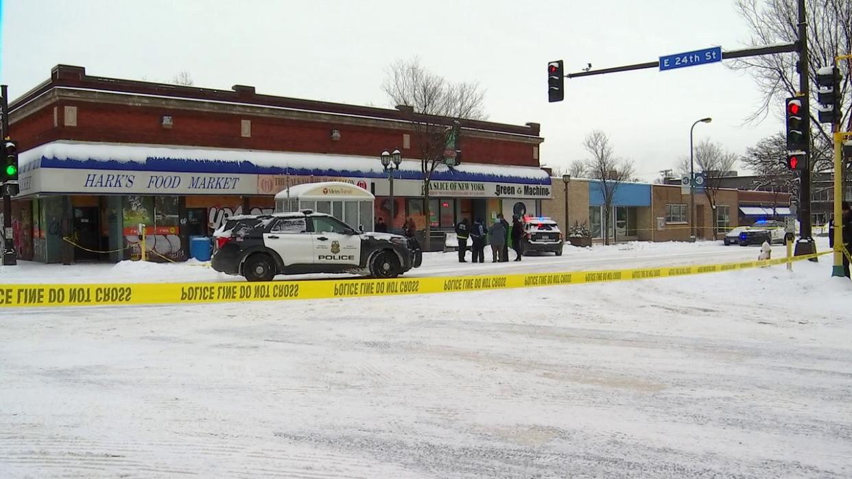 <div>Investigators work a murder case along Eat Street on a snowy day in December 2022.</div> <strong>(FOX 9)</strong>