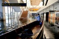 Flooding can threaten key infrastructure like this airport in Bangkok, deluged during huge 2011 floods