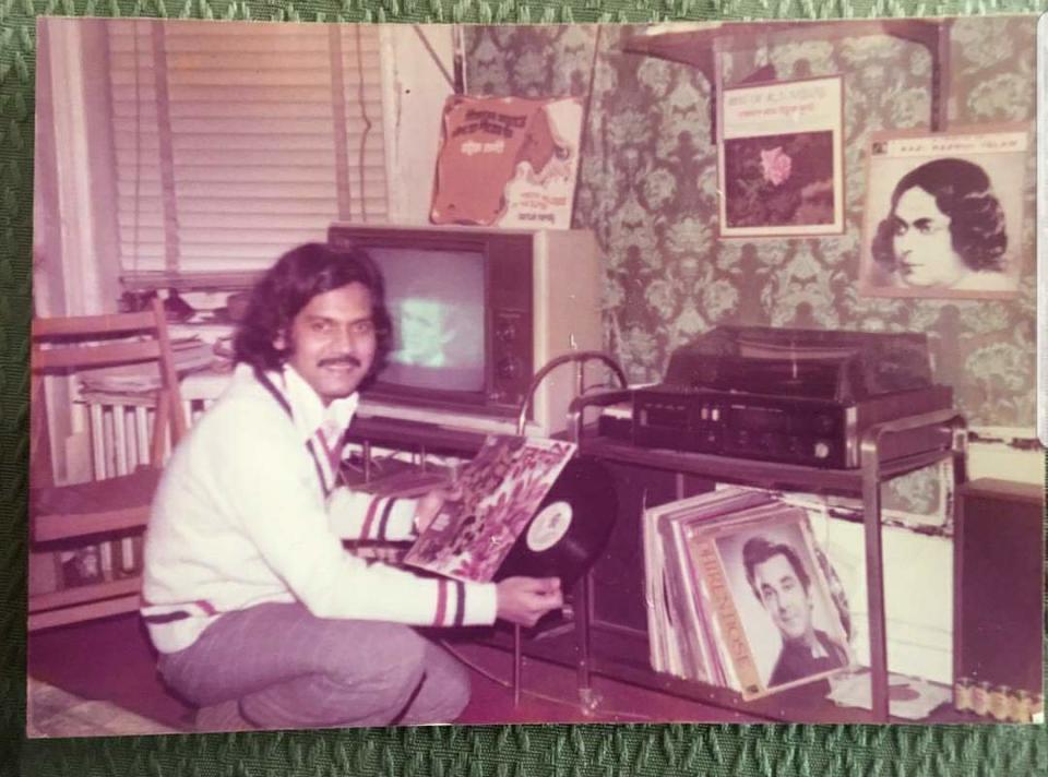 "This was taken in the mid '70s in NYC. My father, Harun Syed, had immigrated to the US from Bangladesh alone in 1968 at 17 years old, and this is him after a few years of getting into the American music scene. He takes great pride in learning about different cultures and being able to have meaningful conversations with people who come from those cultures. He's not one to just listen to someone speak; he always asks questions and engages." -- <i>Arif Syed</i>