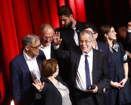 Austrian presidential candidate Alexander Van der Bellen, who is supported by the Greens, reacts at an election party in Vienna, Austria, December 4, 2016. REUTERS/Leonhard Foeger