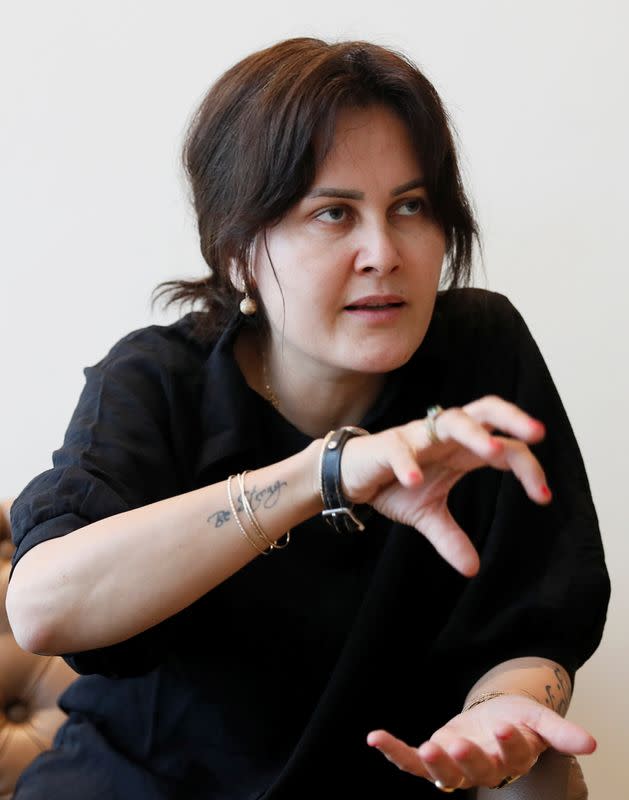 Afghan filmmaker Sahraa Karimi speaks during an interview with Reuters in Kyiv